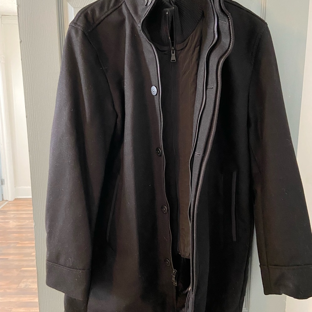 Men Express black wool coat with inside bib for warmth size Large slightly worn.